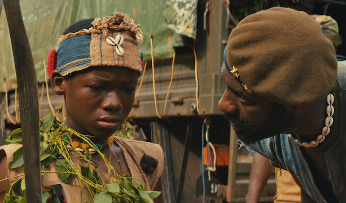 Abraham Attah e Idris Elba en un momento de "Beasts of no Nation"